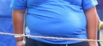 Bauch eines übergewichtigen zehnjährigen Jungen. Foto: tobyotter / Flickr (CC BY 2.0)