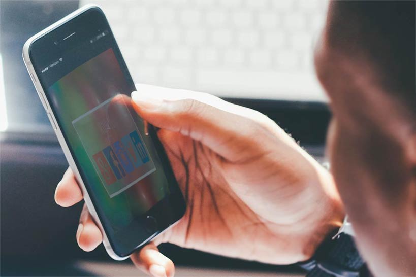 Someone looking on his mobile