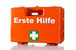 Erst Hilfe Koffer, orange mit weißem Kreuz auf grünem Grund